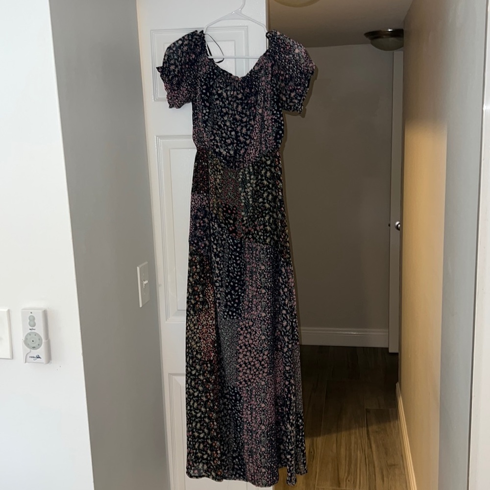 Gently worn maxi dress with open leg slit. Perfect for brunch or bridal shower.